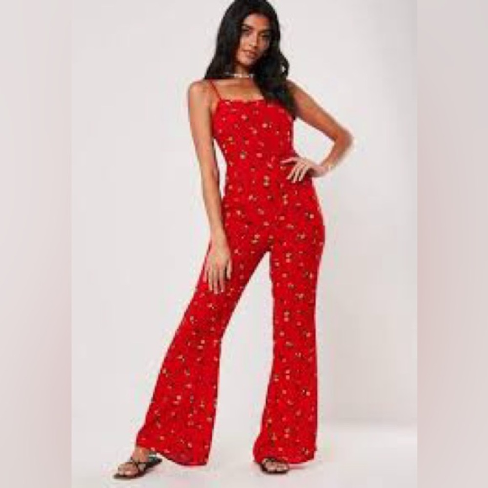 Red jumpsuit with yellow flowers